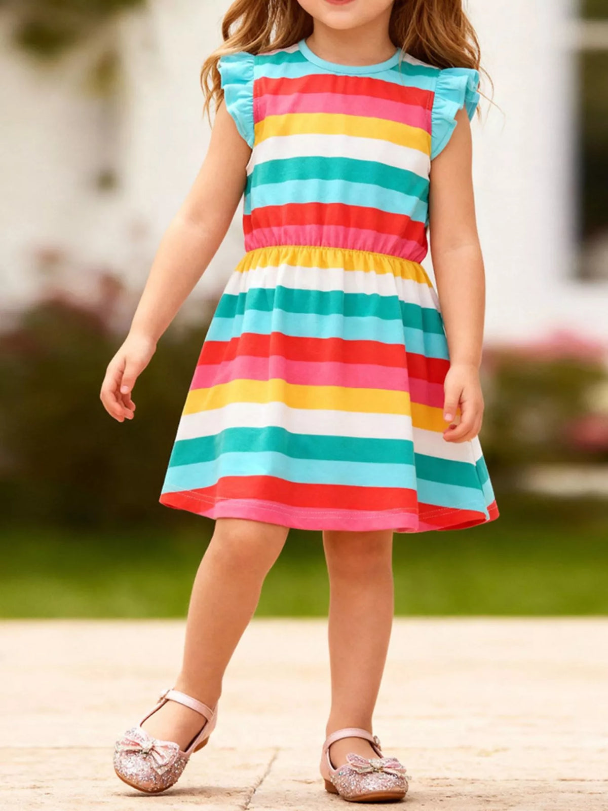 Colorful striped sleeveless dress with shoulder ruffles on a child