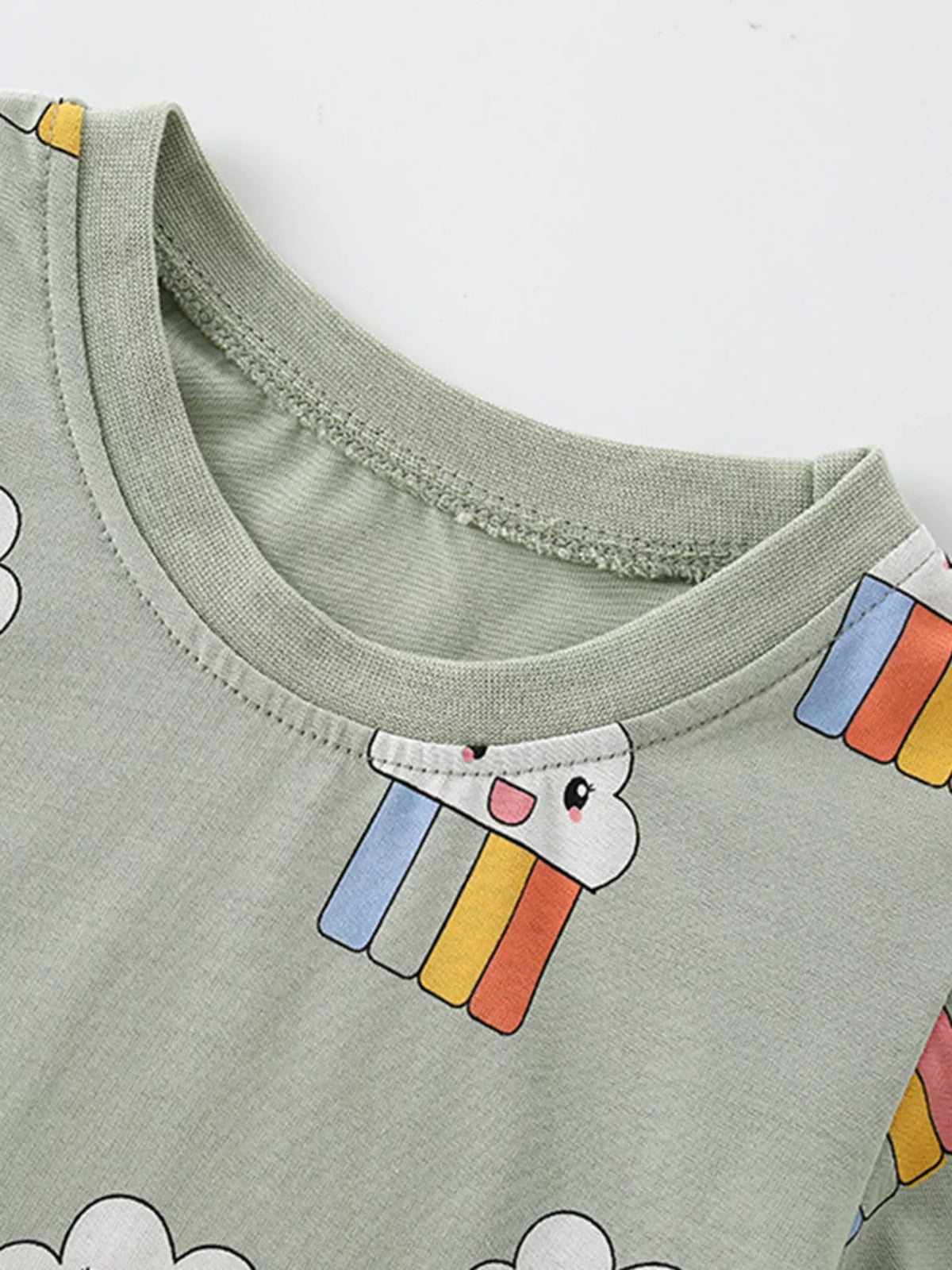 Sage cloud and rainbow print shirt — round neckline