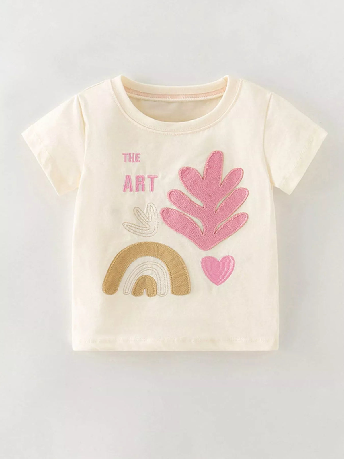 Cream abstract rainbow and leaf applique shirt — front