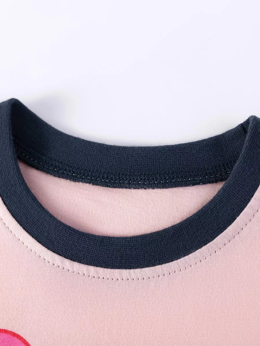 Navy contrast neckline on the pink tee