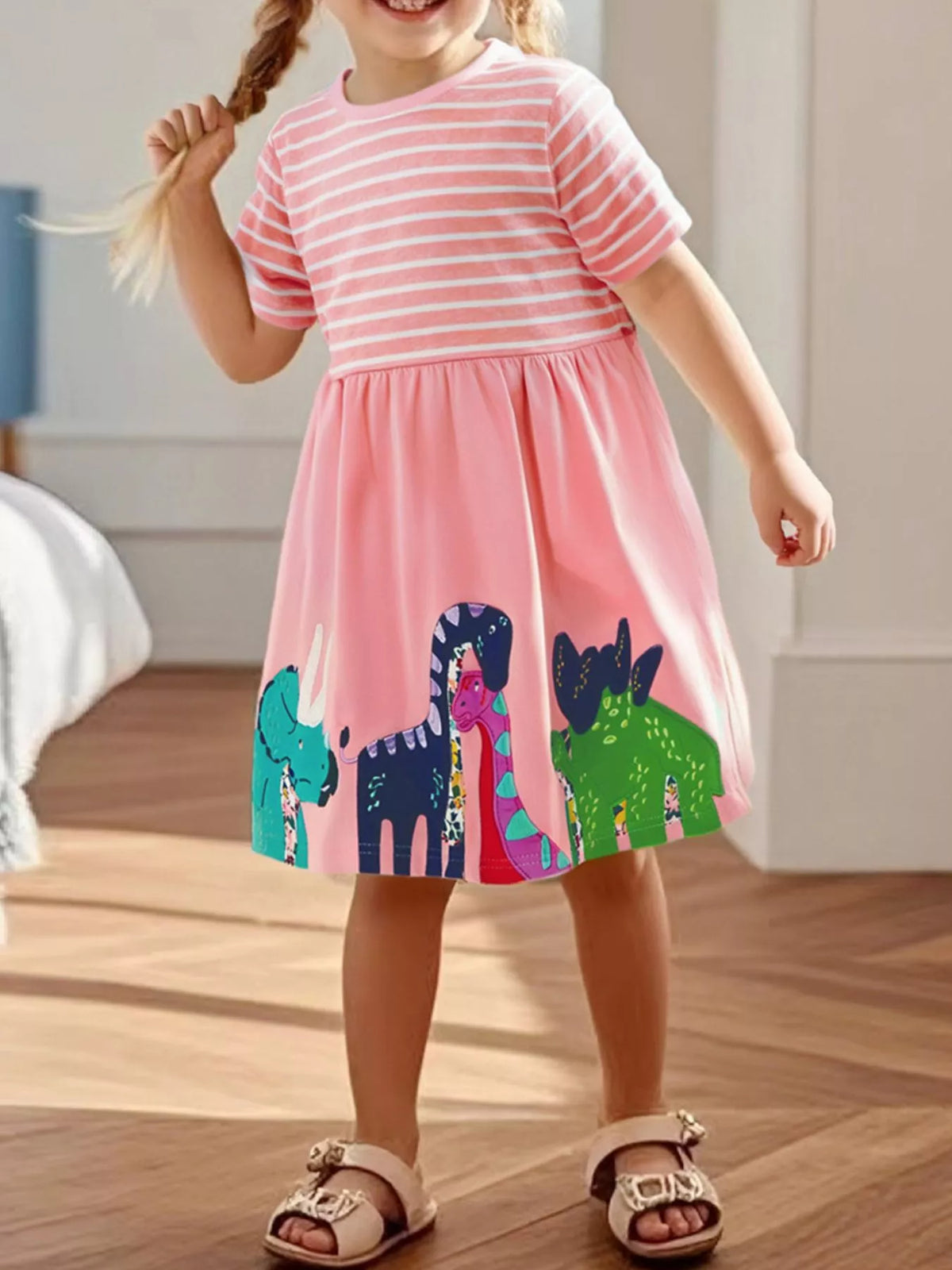 Striped Animal Applique Cotton Dress — pink dinosaur dress worn by a child