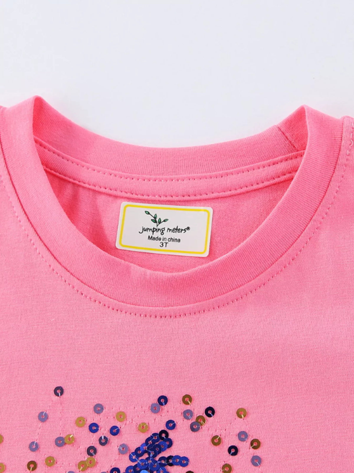 Pink sequin star shirt — round neckline