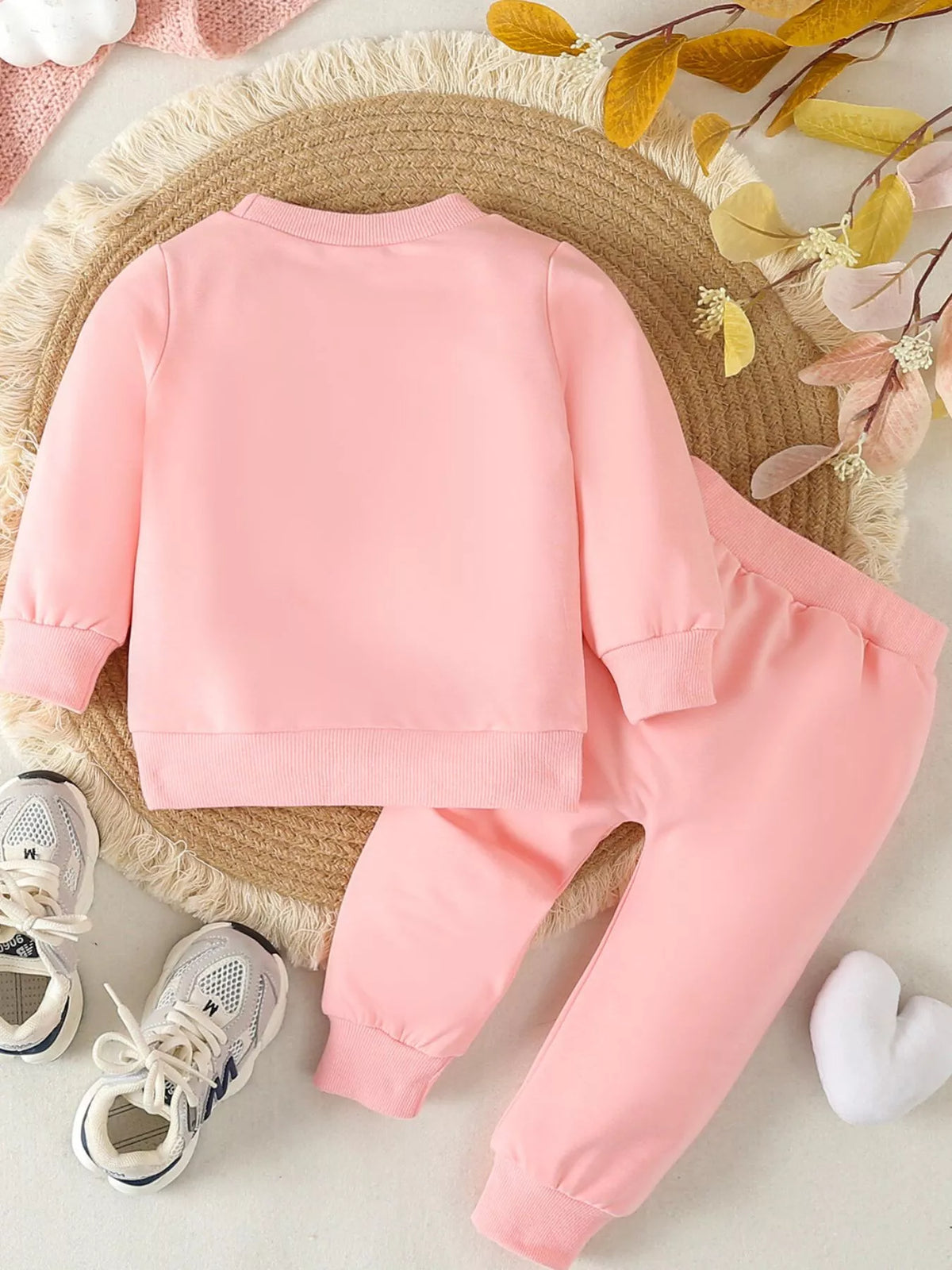 Back of the pink top and pants
