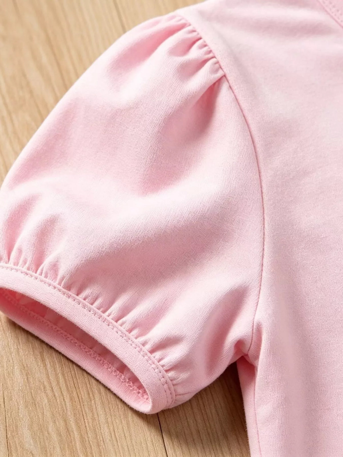 Gathered pink puff sleeve