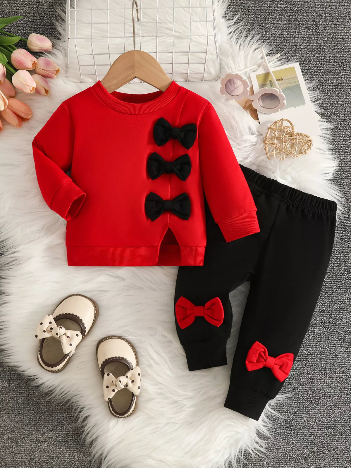 Bow embellished sweatshirt and black pants set — red outfit front
