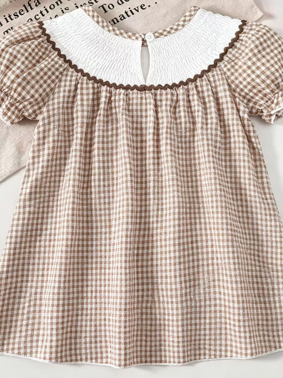 Back of the brown gingham dress