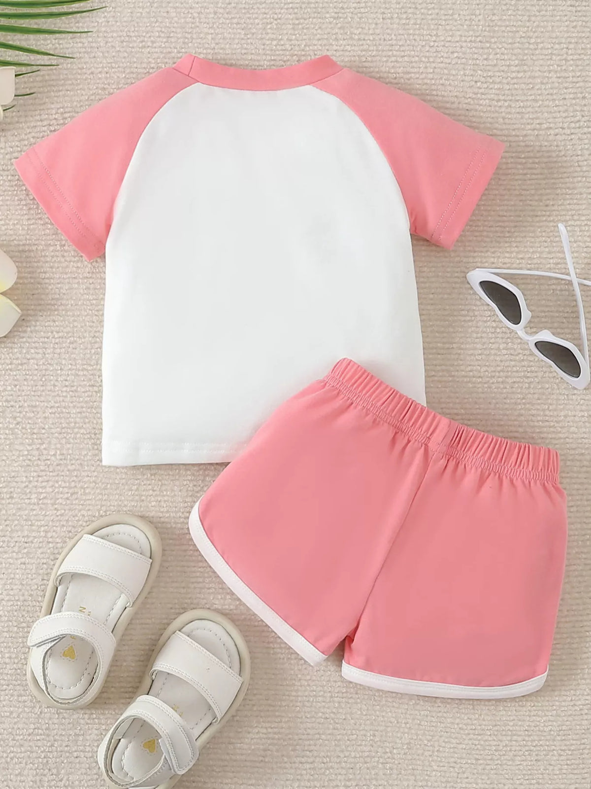 Back of the white-and-pink tee and shorts