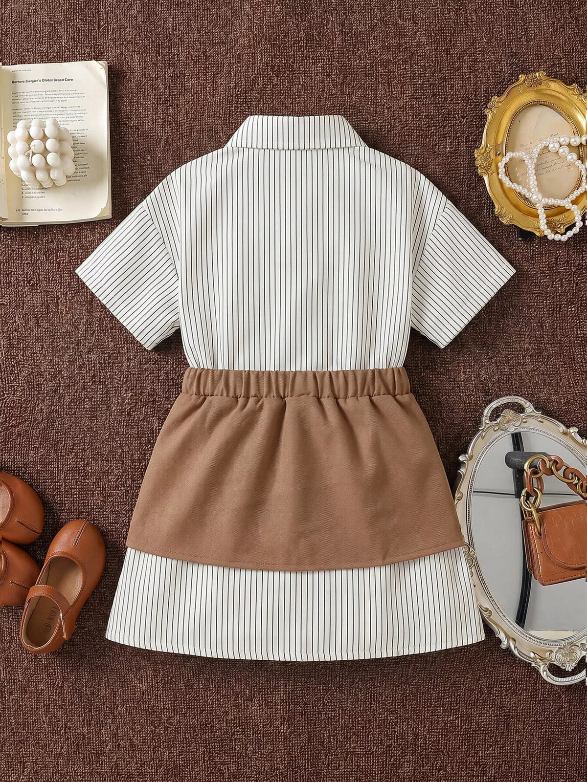 Back of the striped shirt dress with gathered brown waist panel