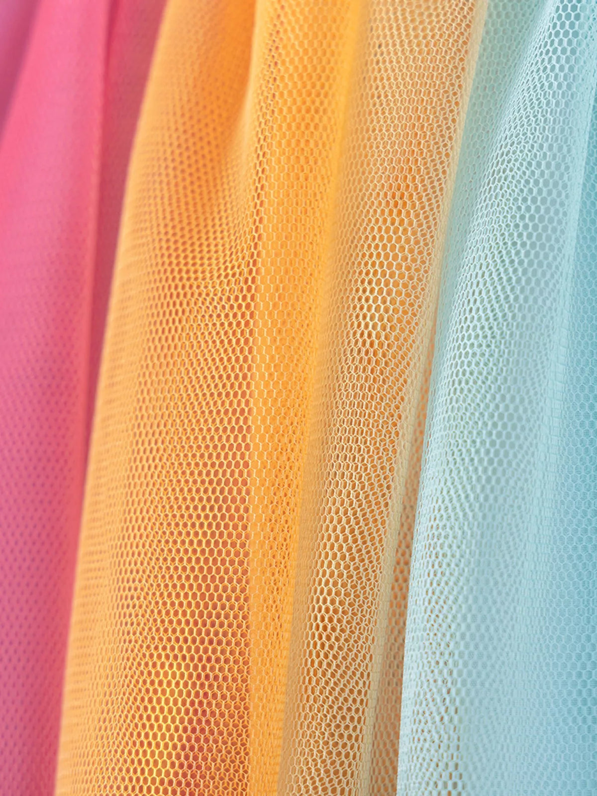 Bright pink, yellow and aqua tulle panels