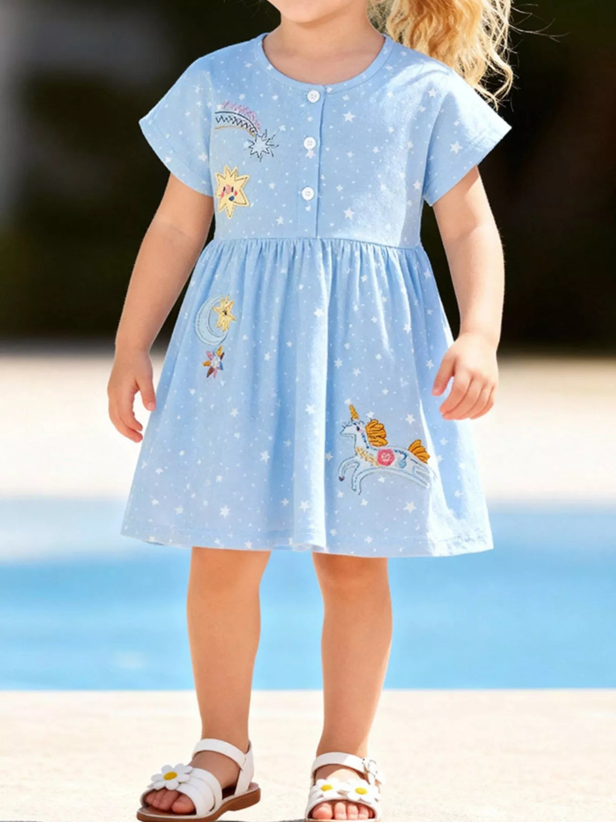 Blue Unicorn and Star Embroidered Dress — dress worn by a child