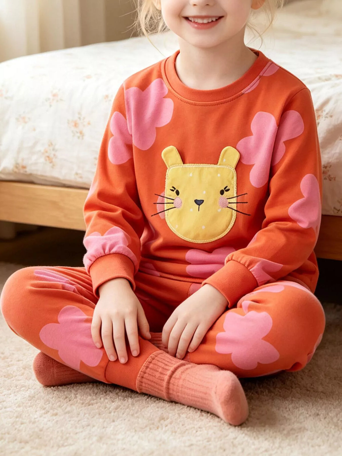 Outfit on a cross-legged child