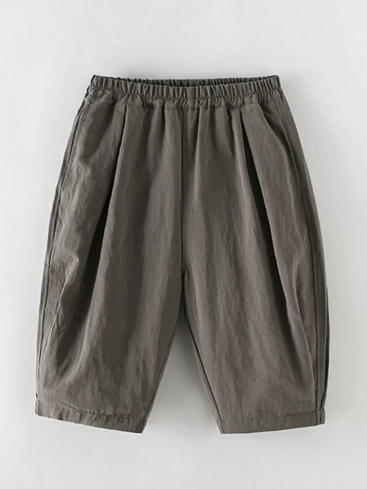 Dark gray loose-fit capri pants laid flat