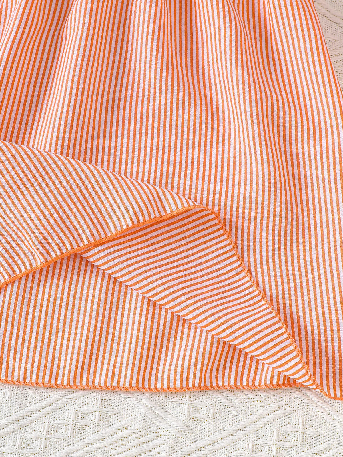 Baby Embroidered Yoke Striped Dress — orange hem detail