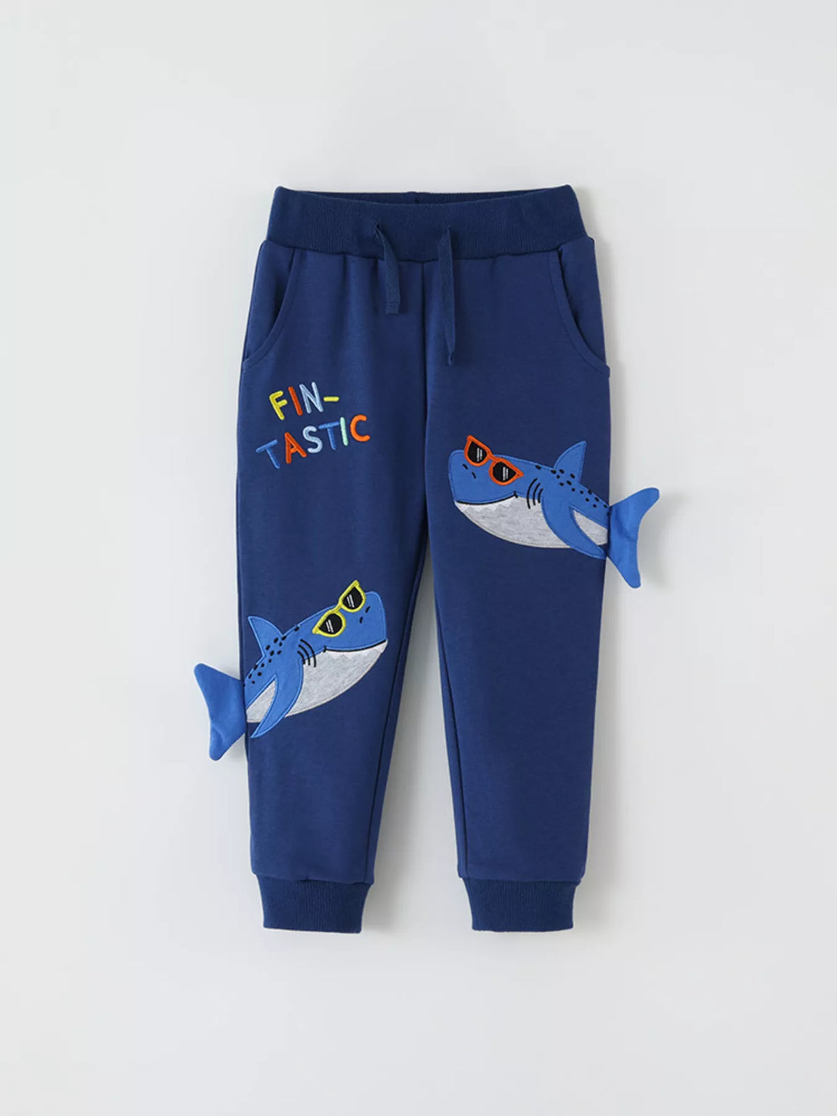 Navy shark-applique joggers laid flat