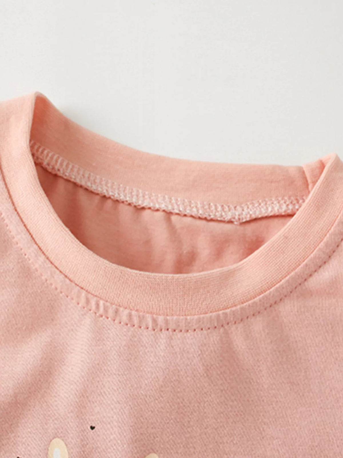 Peach dressed animal graphic puff sleeve shirt — round neckline
