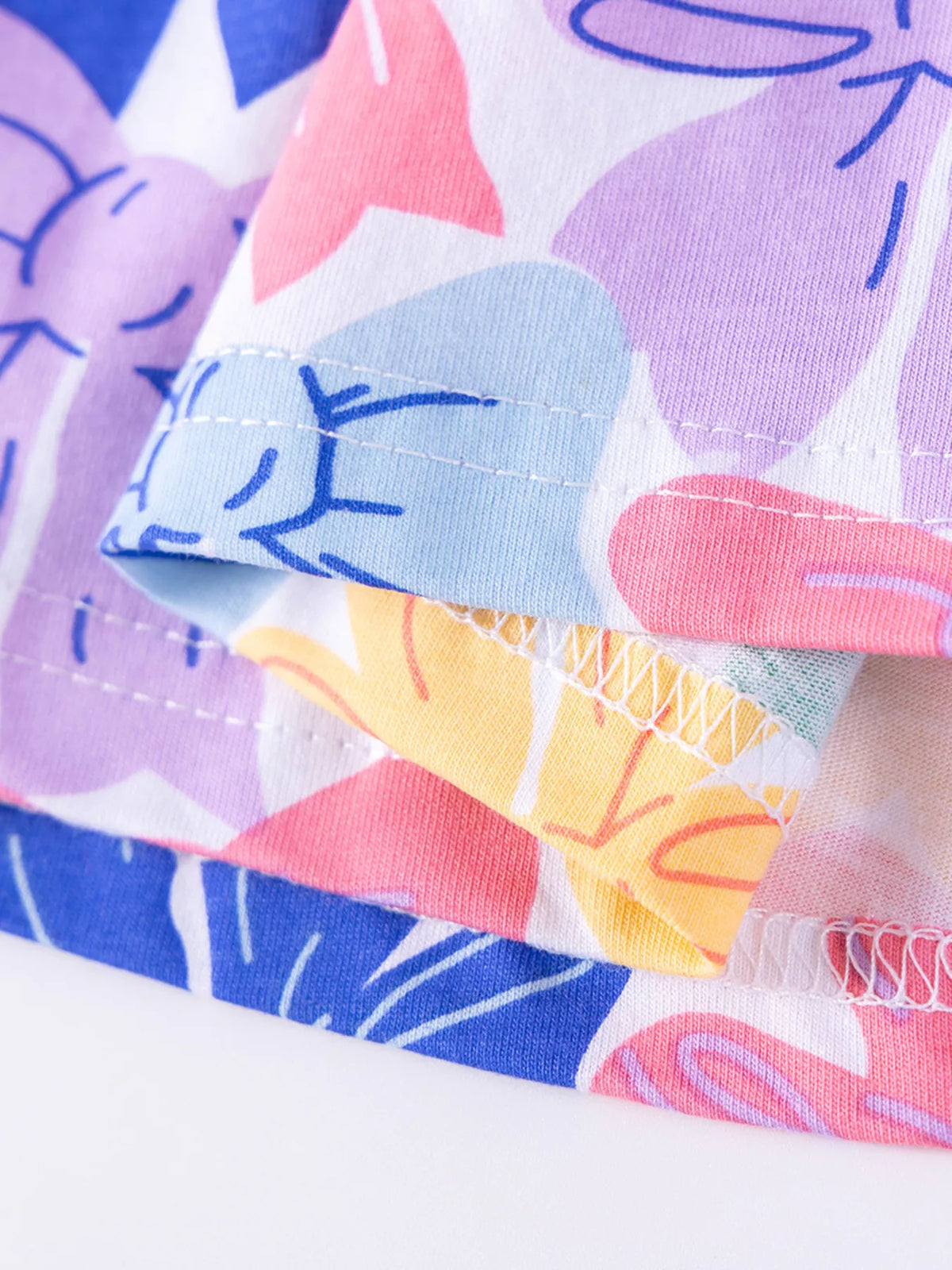 Inside stitching at the bow-print hem
