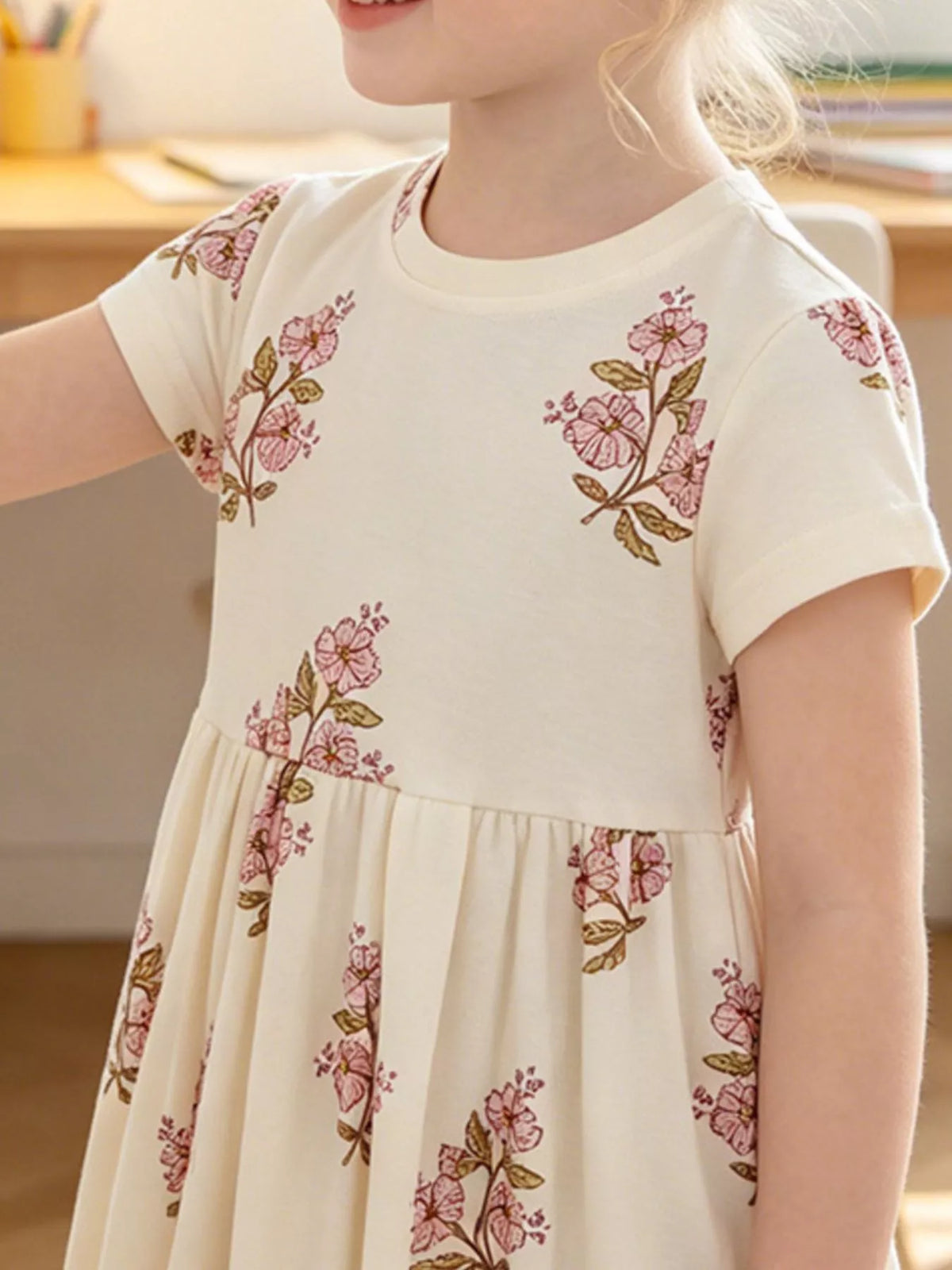 Cream pink floral short sleeve dress — dress shown on child