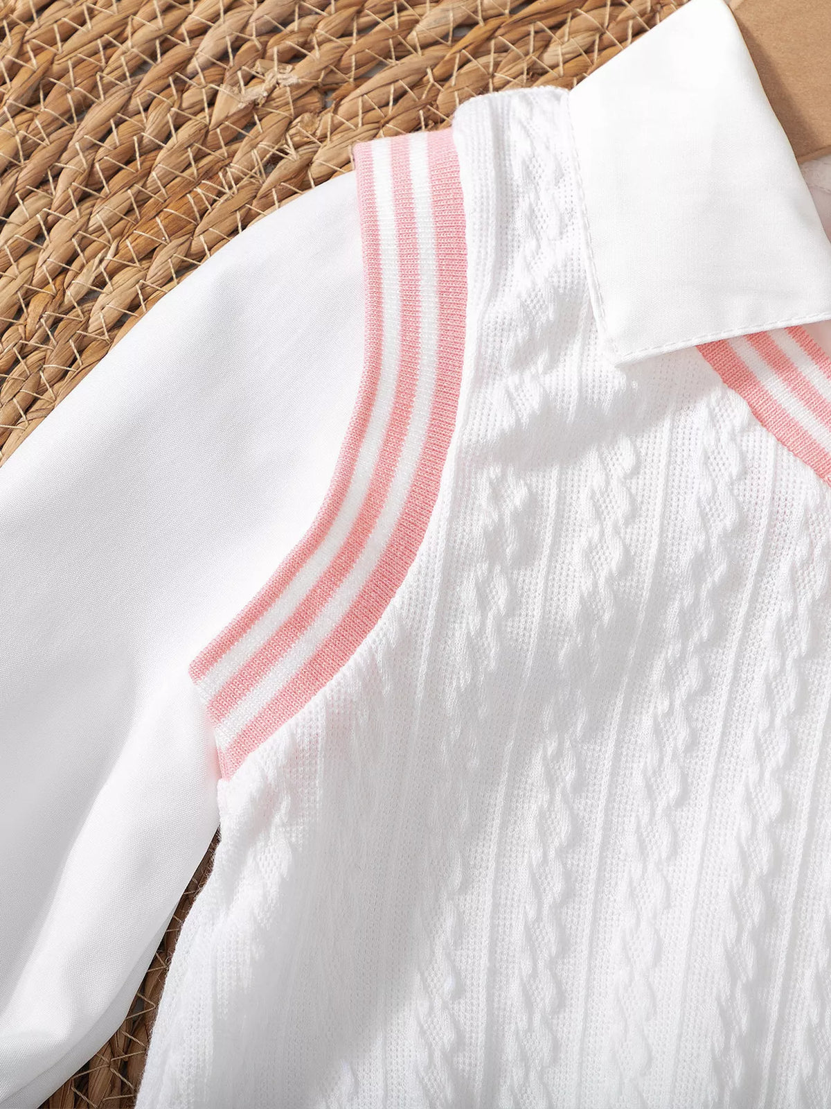 White button cuff and pink striped trim