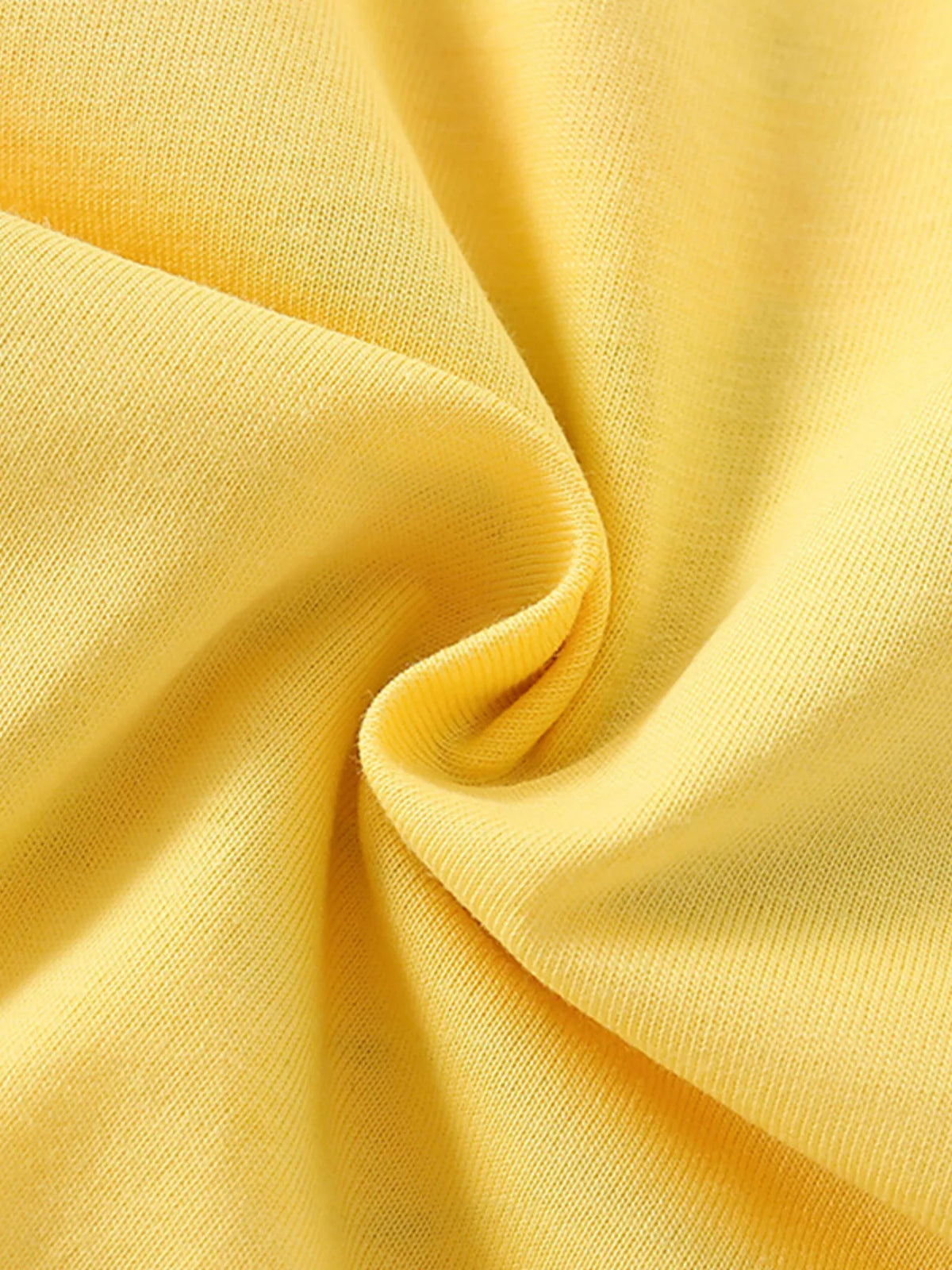 Yellow winged unicorn rainbow ruffle hem top — yellow fabric