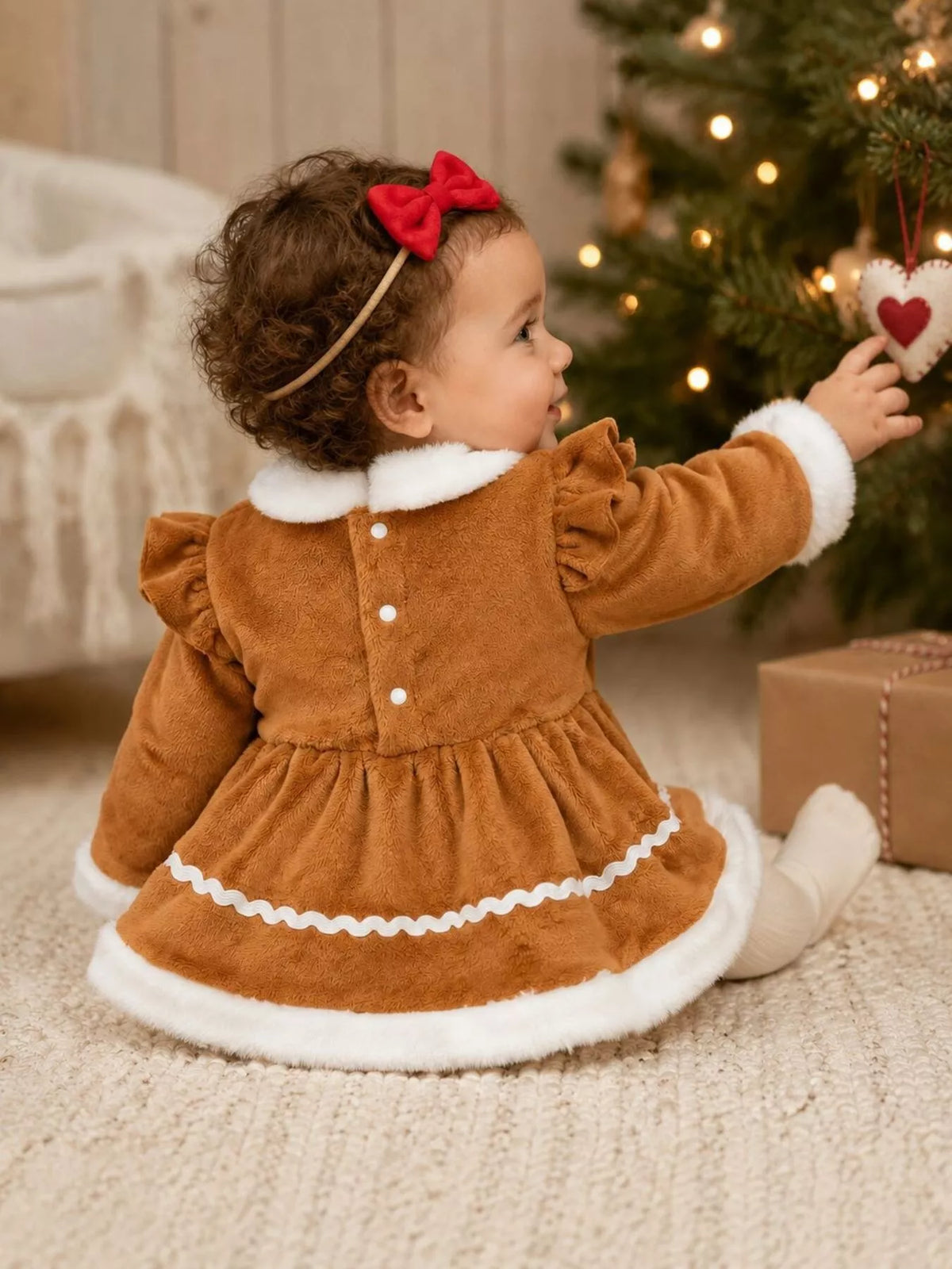 Back of the caramel outfit on a seated baby