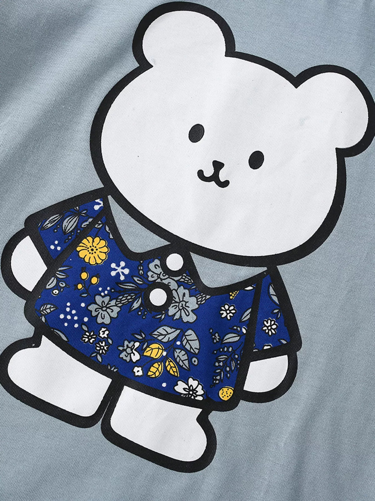 Blue bear graphic ruffle sleeve shirt — bear wearing floral outfit graphic