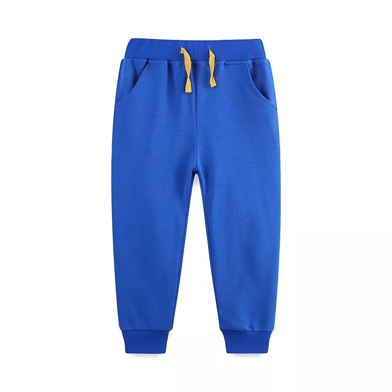 Royal blue drawstring joggers laid flat