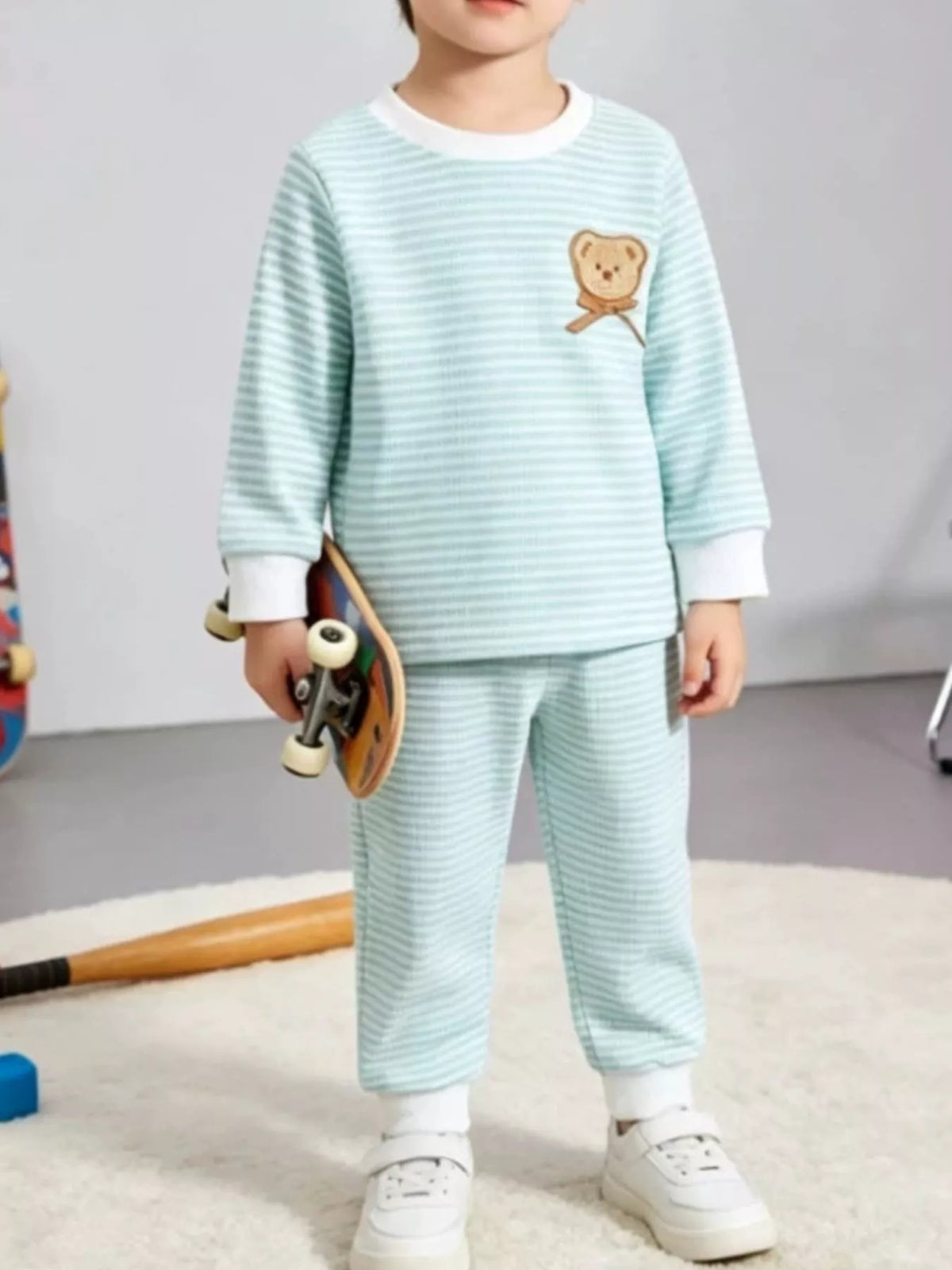 Pale blue striped outfit on a child