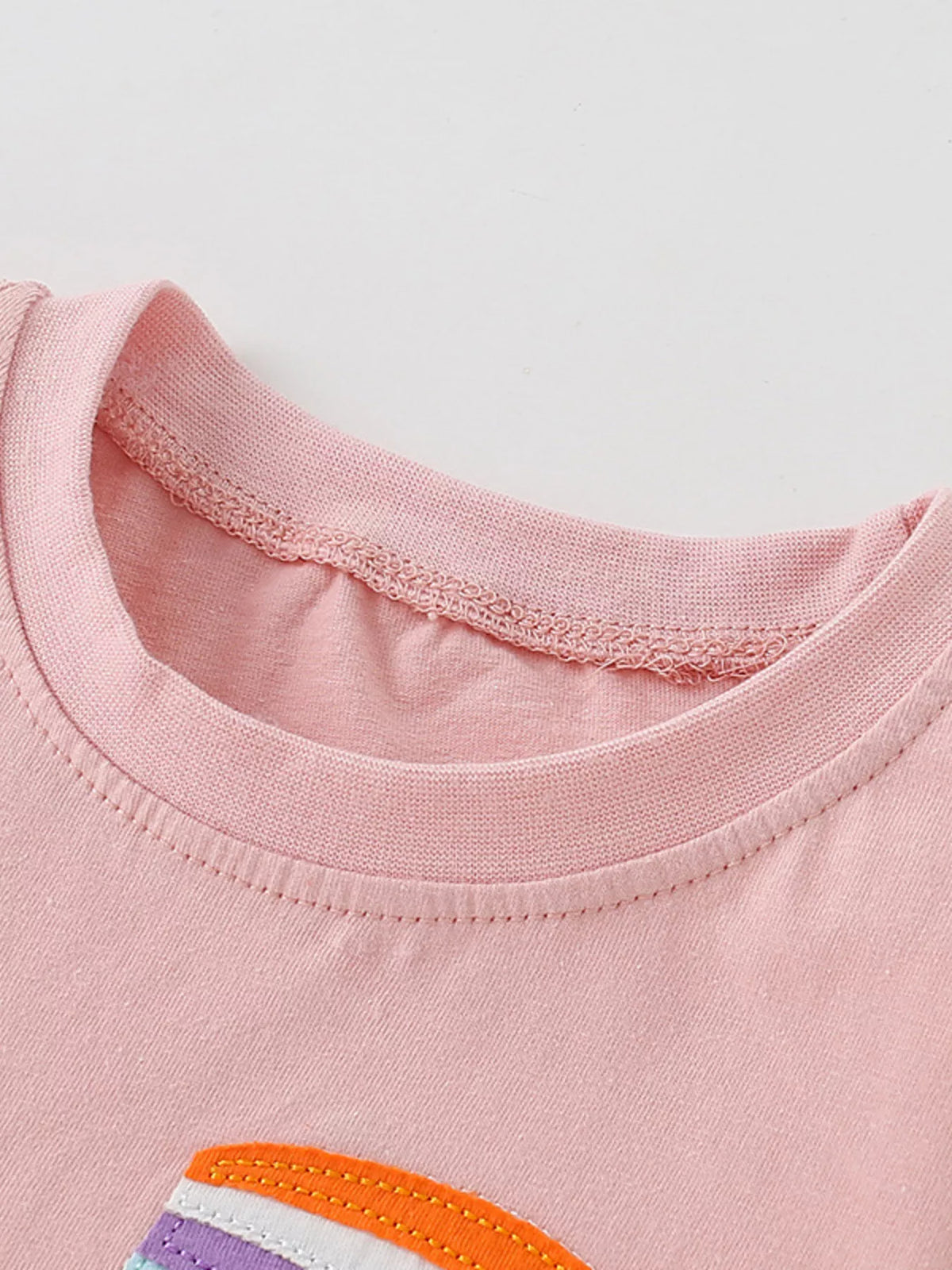 Peach rainbow vehicle applique shirt — round neckline