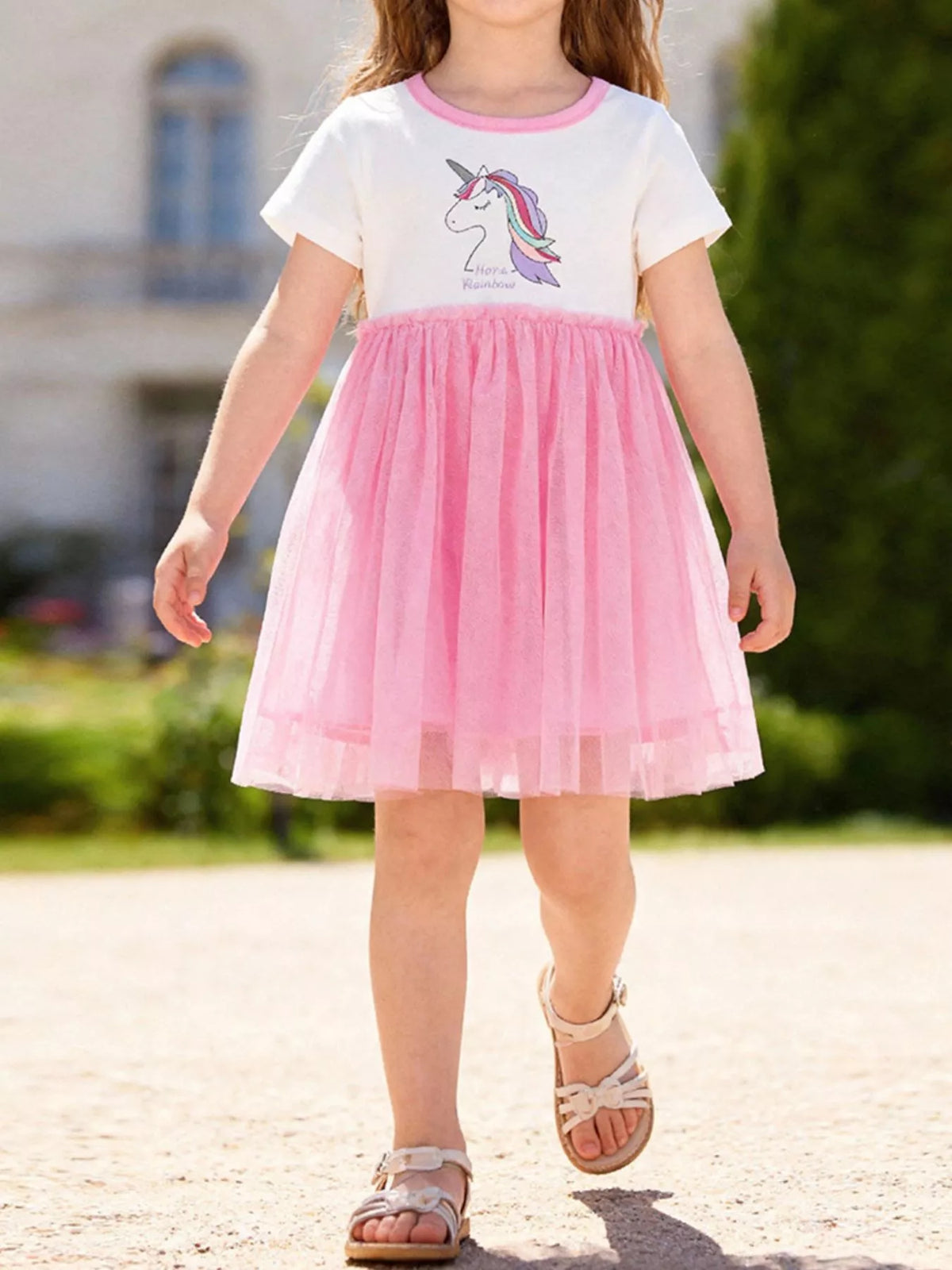 Pink Unicorn Graphic Tulle Dress — dress worn by a child