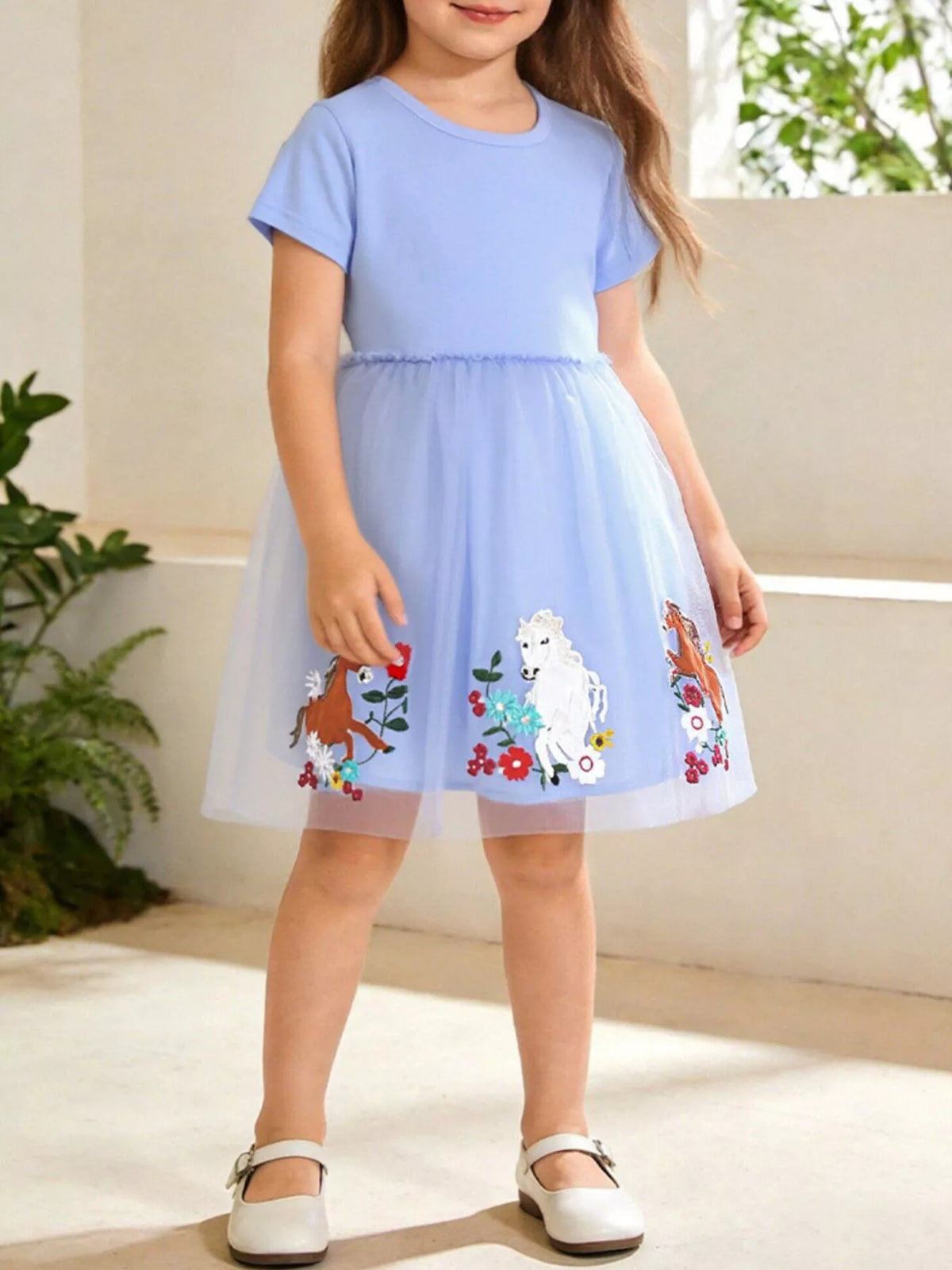 Blue Horse Embroidered Tulle Dress — dress worn by a child
