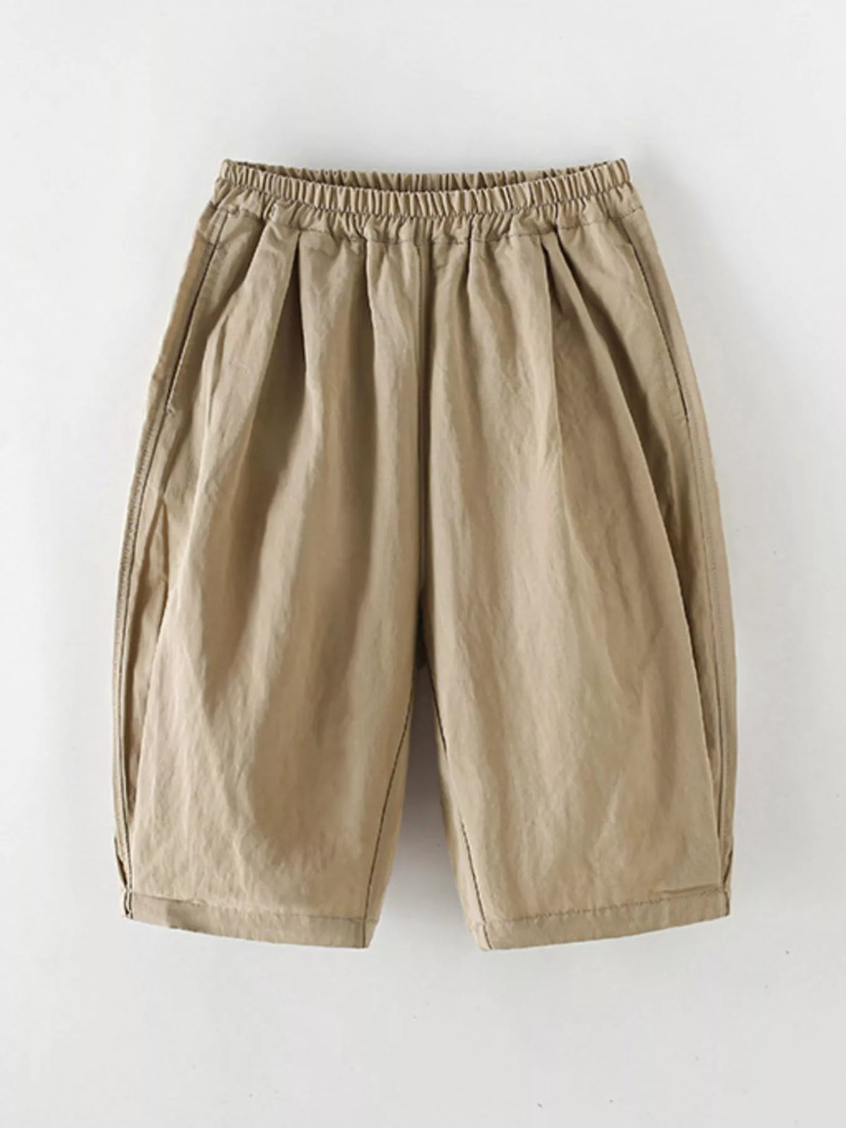 Camel elastic-waist capri pants laid flat