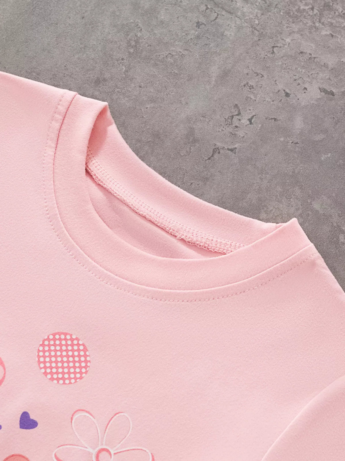 Pink bunny pocket graphic shirt — round neckline