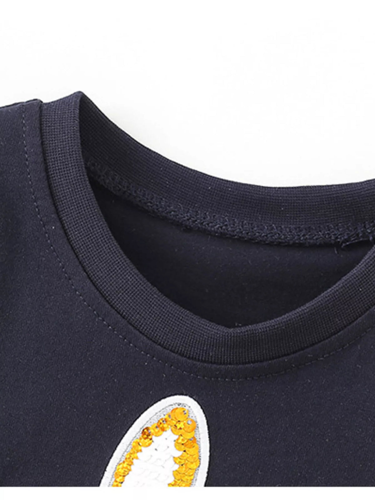 Black sequin rabbit ruffle hem shirt — round neckline