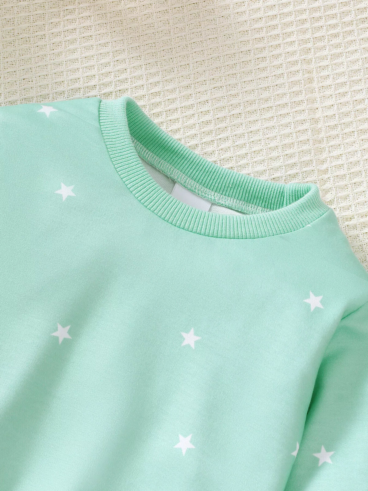 Mint star print sweatshirt and joggers — ribbed round neckline