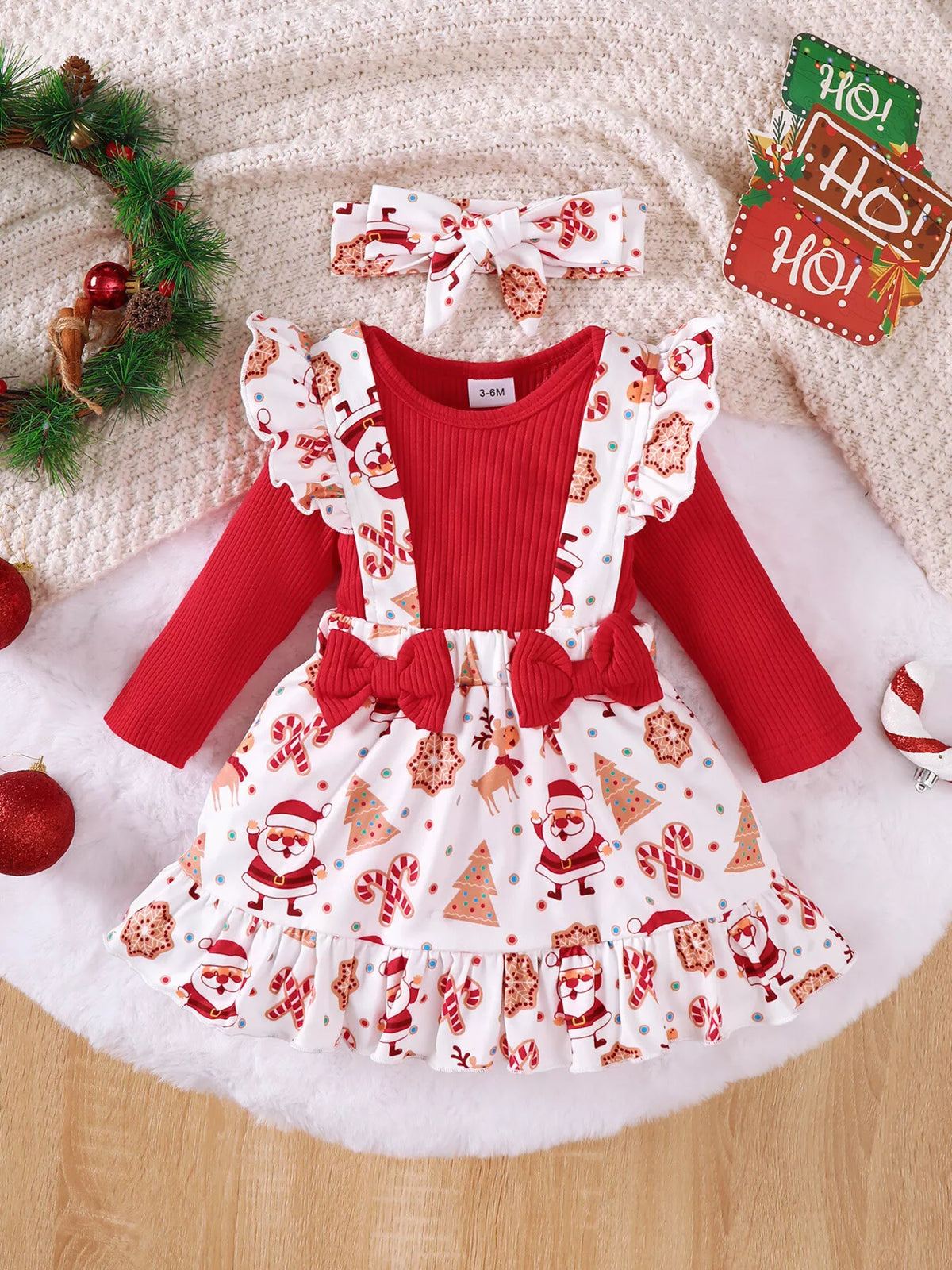 Red ribbed bodysuit Santa suspender skirt and headband — full outfit front