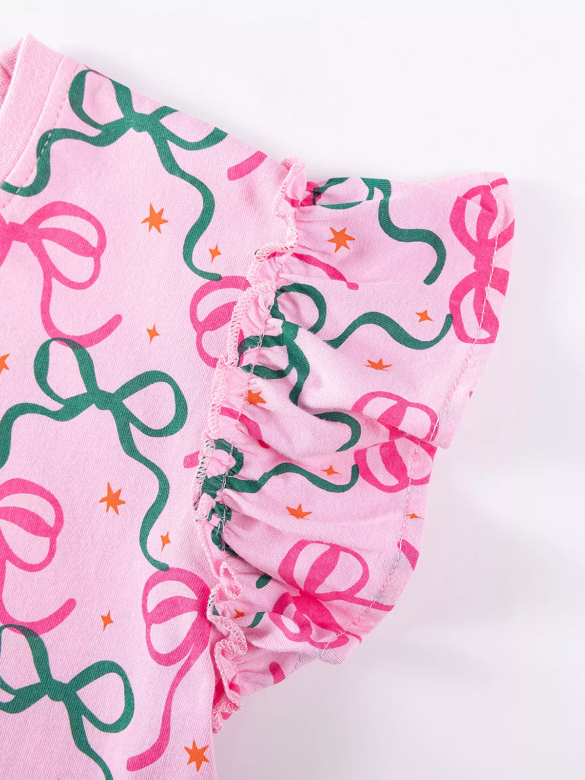 Bow-print shoulder ruffle