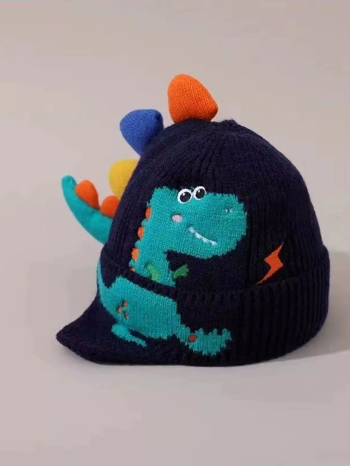 Dinosaur Knit Hat with Earflaps — navy hat side view