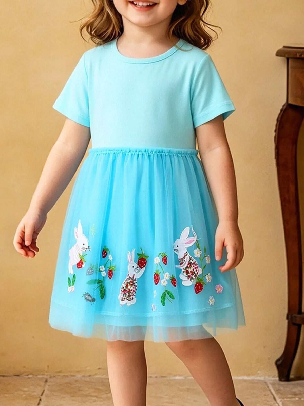 Aqua Bunny Embroidered Tulle Dress — dress worn by a child