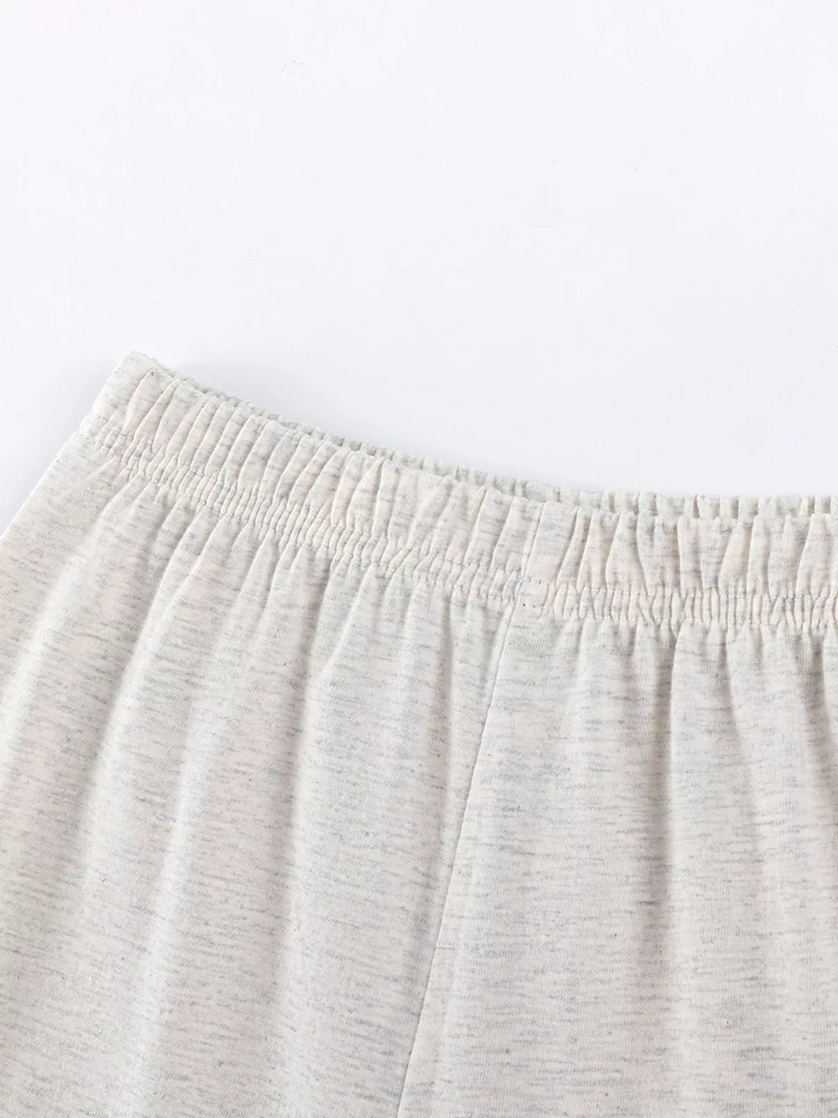 Elastic waistband on pale shorts