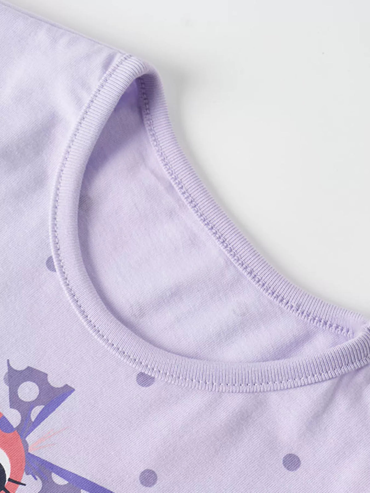 Lavender polka dot dinosaur graphic shirt — round neckline