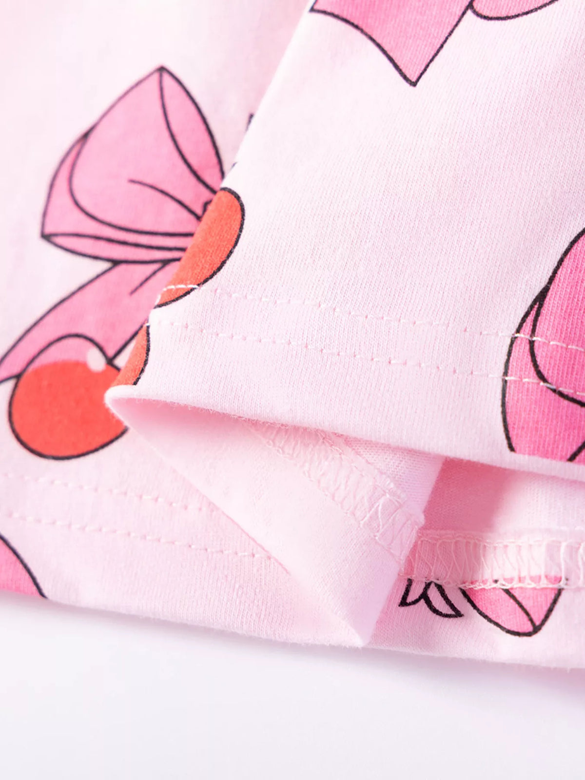 Inside stitching at the pink printed hem