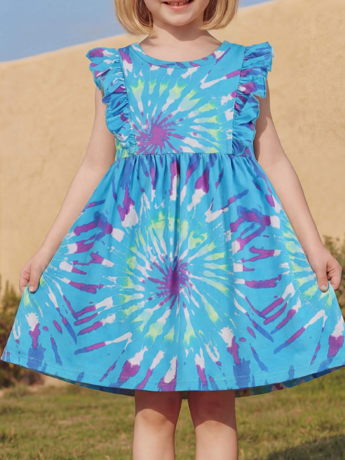 Blue Tie-Dye Ruffle Sleeve Dress — dress worn by a child