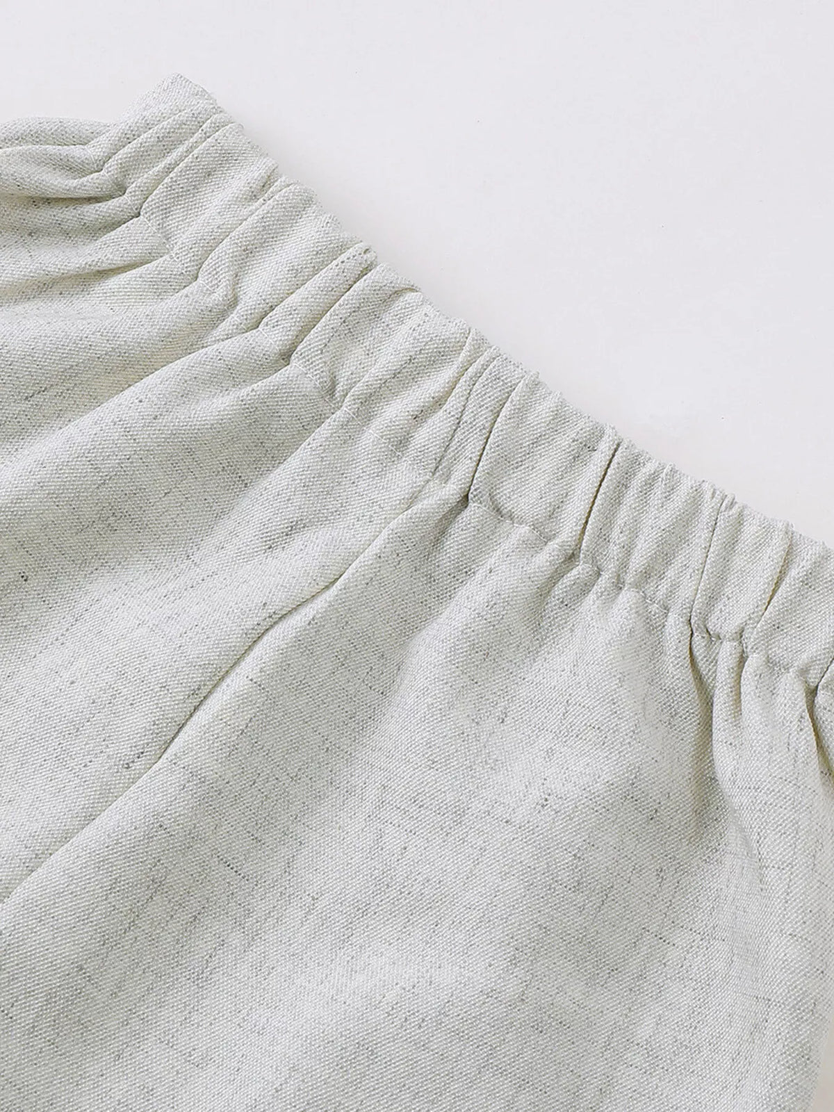 Gray button front vest and pleated shorts set — shorts elastic waistband