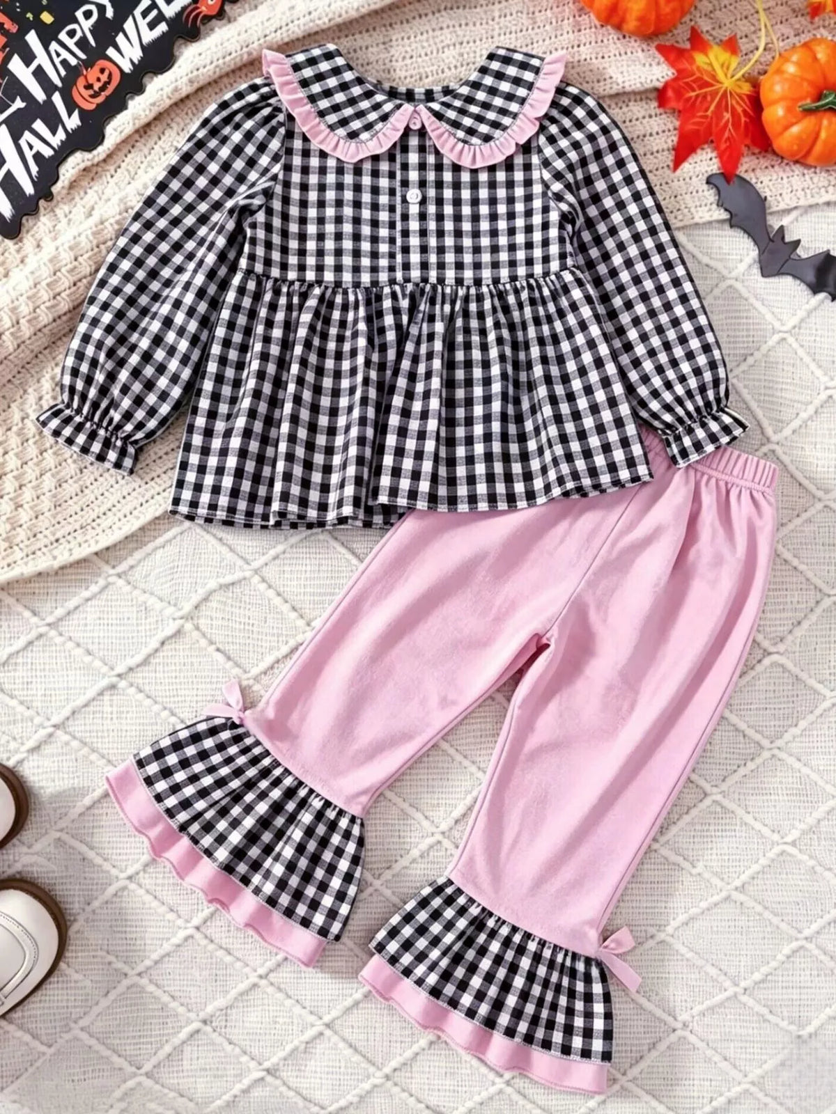 Back of the gingham top and pink pants with checked ruffles