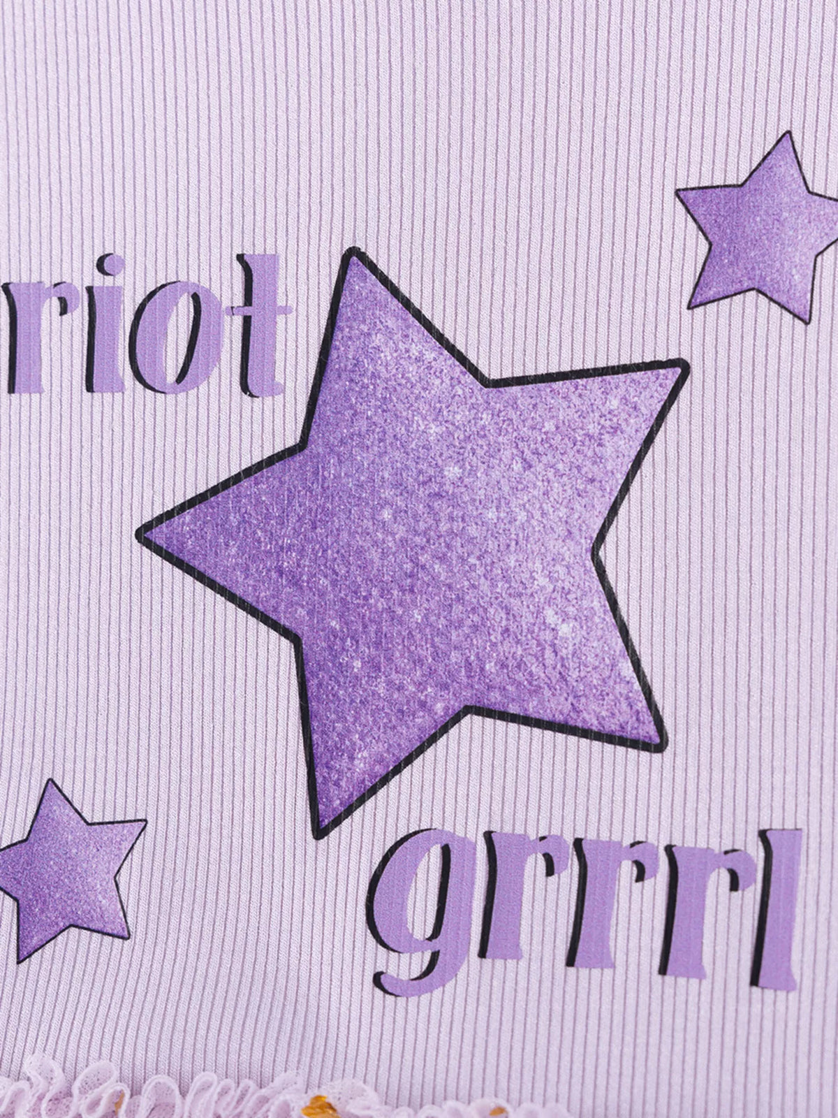 Purple stars and lettering on lavender fabric