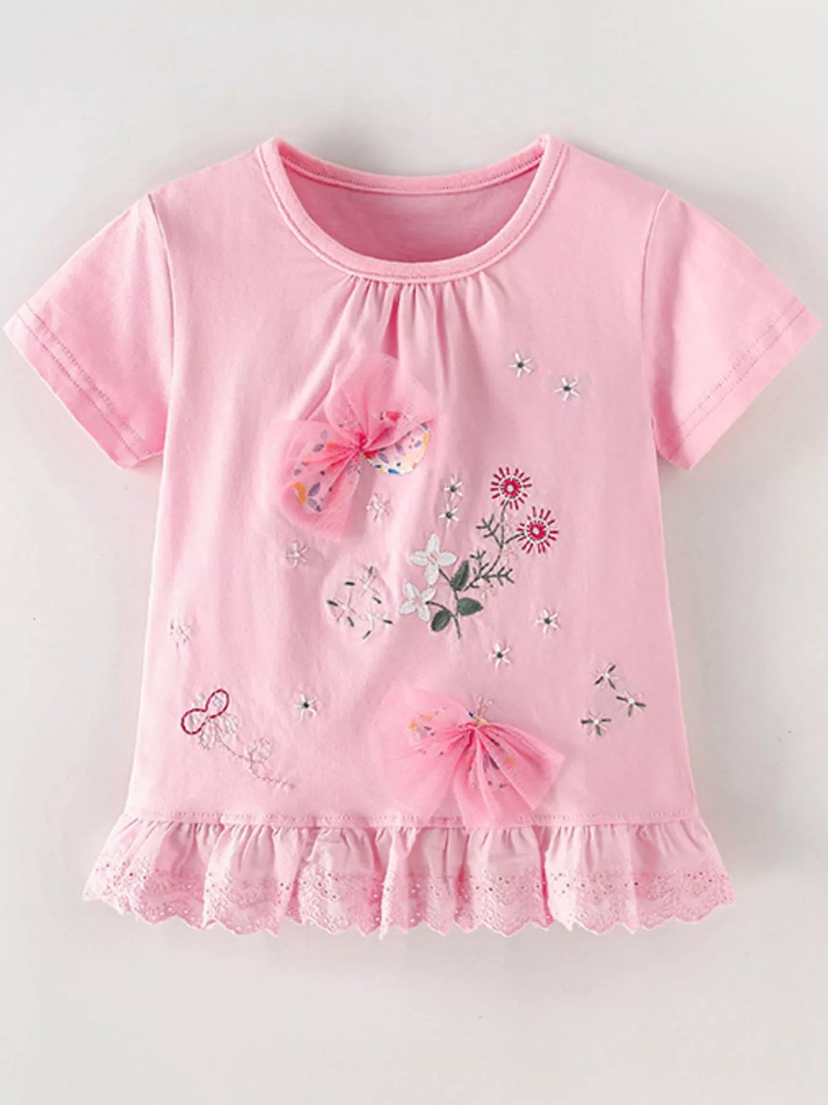 Pink floral embroidered tulle bow ruffle hem shirt — front laid flat
