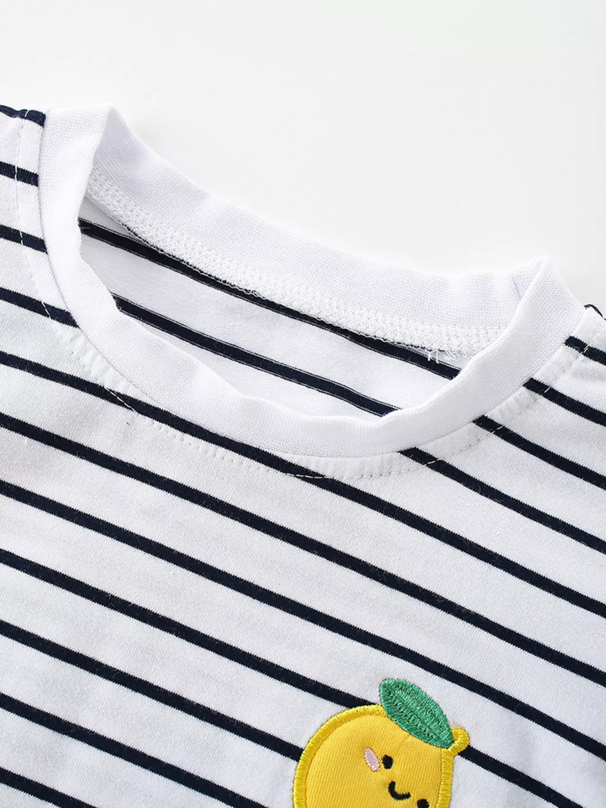 White navy striped lemon applique ruffle sleeve shirt — round neckline