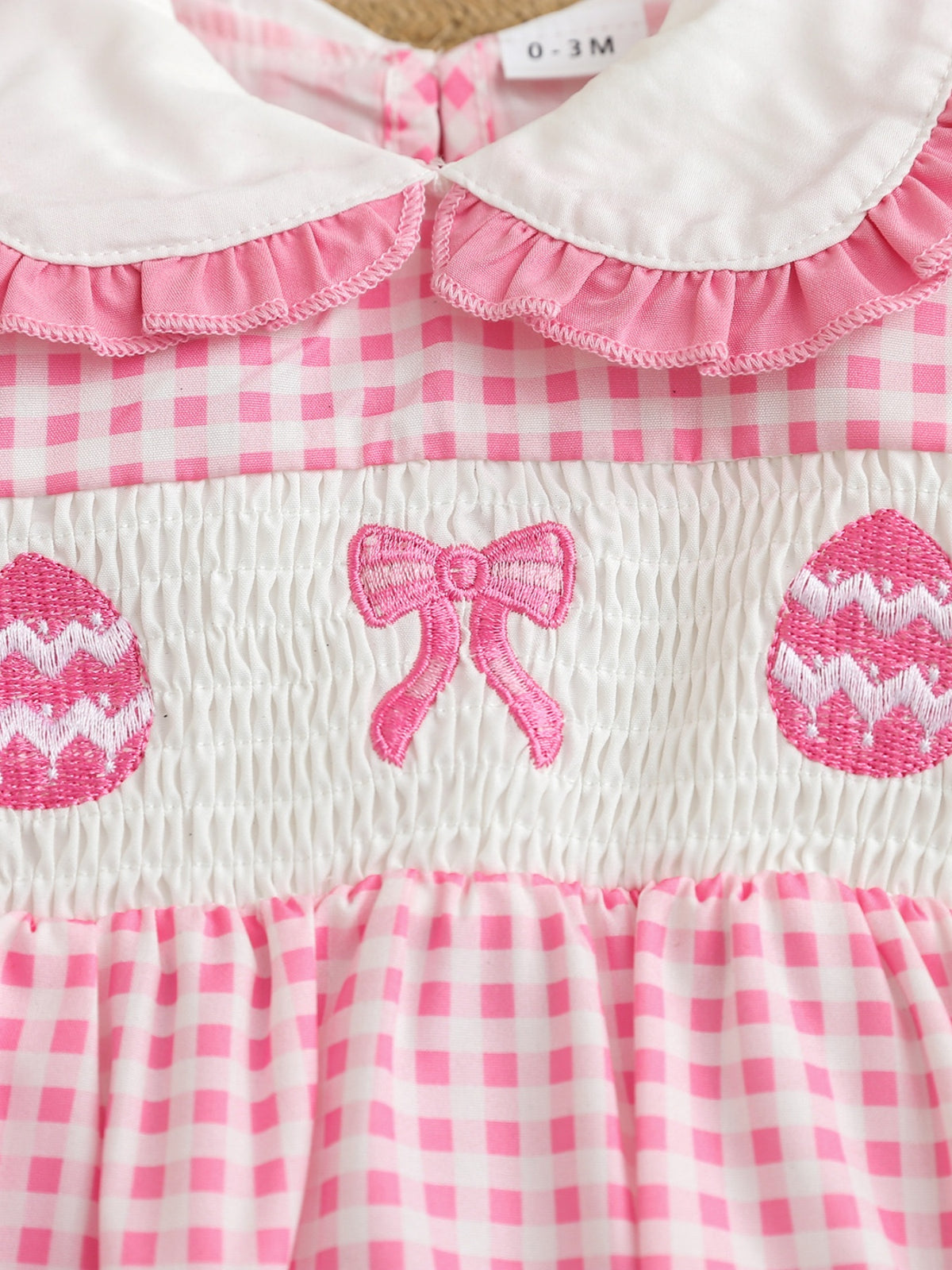 Baby Gingham Embroidered Romper — smocked egg and bow embroidery detail