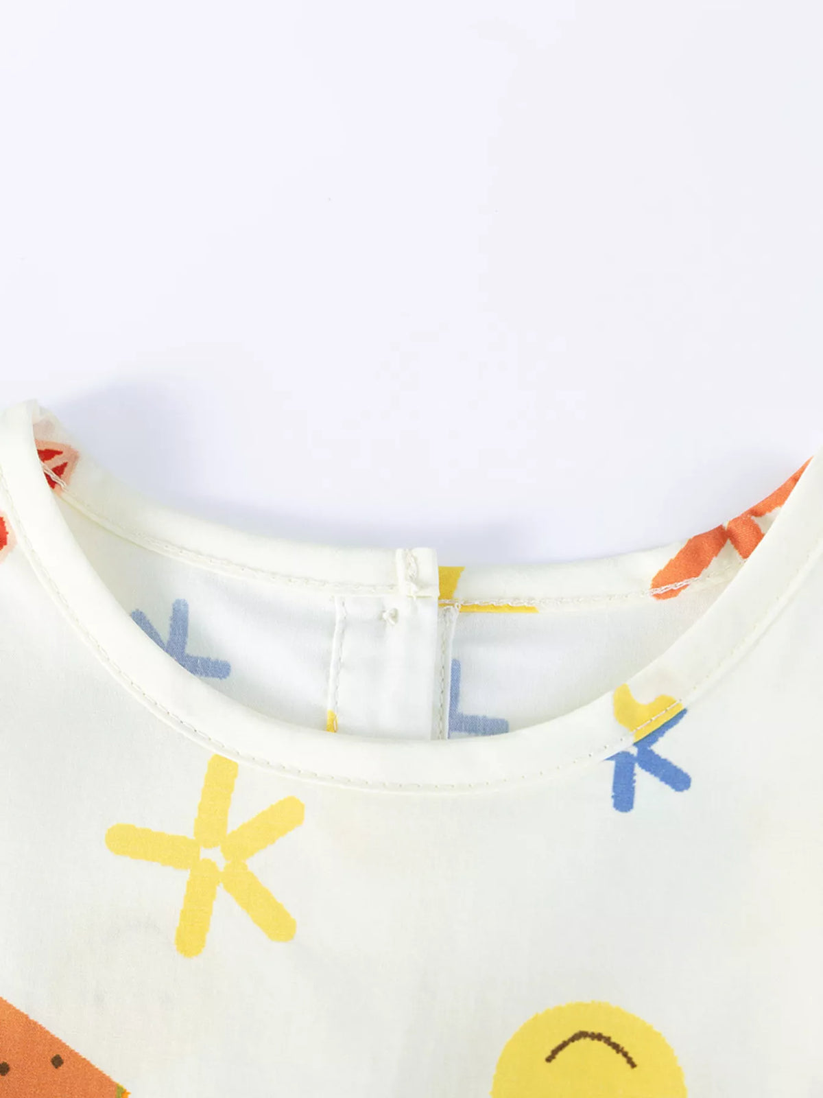 Round neckline and back button opening