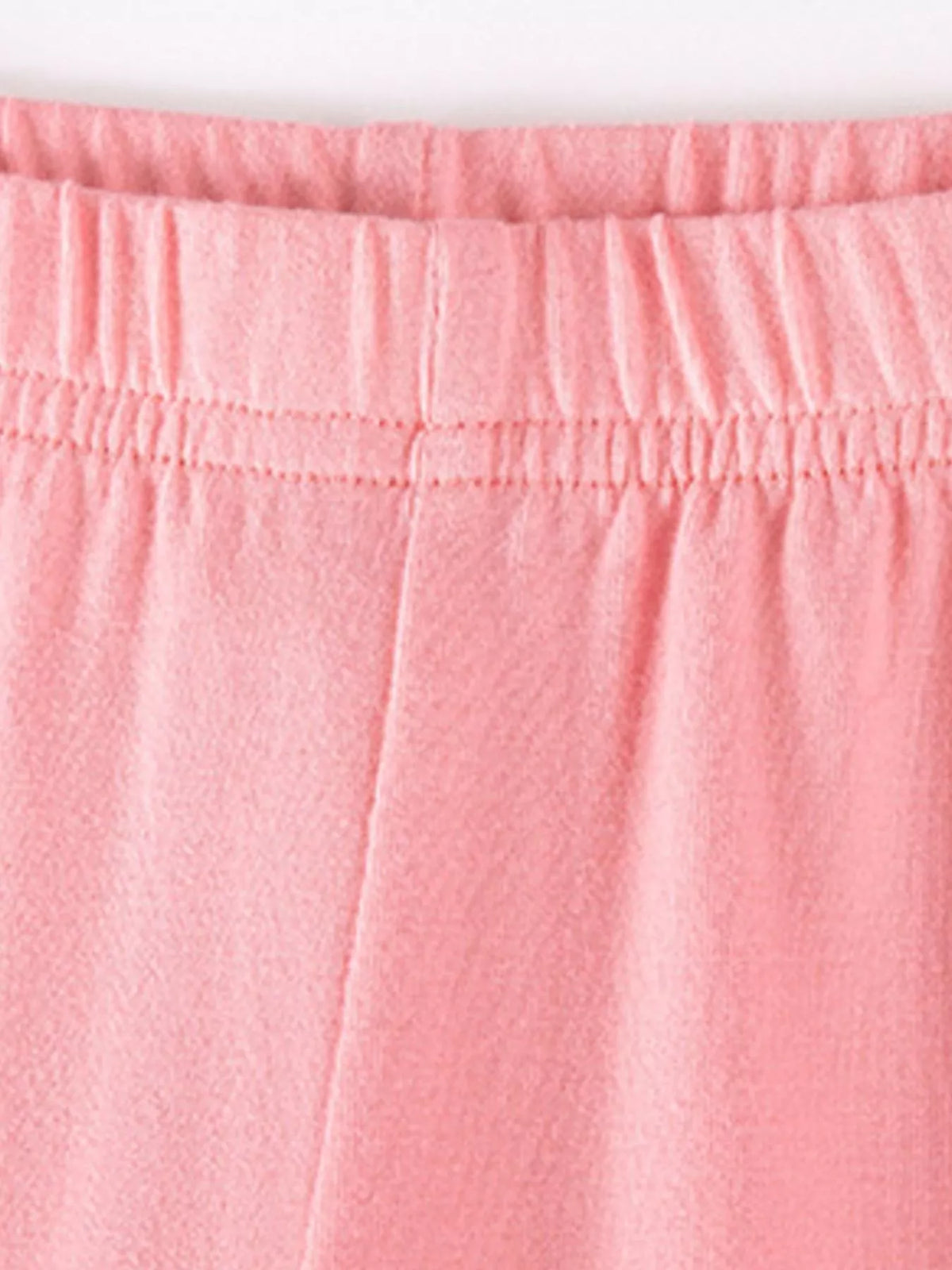 Elastic waistband on pink leggings